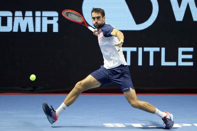 ST PETERSBURG, RUSSIA - OCTOBER 31, 2021: Croatia s Marin Cilic returns the ball in his men s singles final match against the USA s Taylor Fritz at the St Petersburg Open 2021 international tennis tournament at Sibur Arena. Peter Kovalev TASS  TS116682