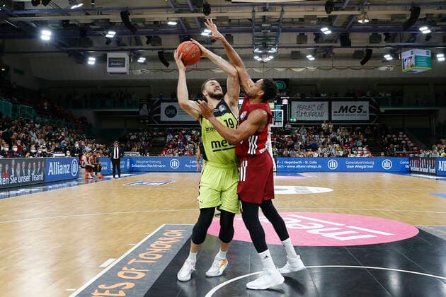 6 Matchday of the easyCredit BBL Basketball Bundesliga at Oberfrankenhalle in Bayreuth Season 2021 2022 Medi Bayreuth vs FC Bayern Munich Martynas Sajus Medi Bayreuth 19 left Augustine Rubit FC Bayern Munich 21 right