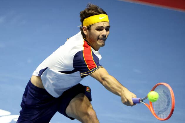 ST PETERSBURG, RUSSIA - OCTOBER 31, 2021: The USA s Taylor Fritz returns the ball in his men s singles final match against Croatia s Marin Cilic at the St Petersburg Open 2021 international tennis tournament at Sibur Arena. Peter Kovalev TASS  TS1166AE