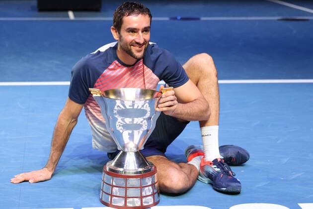 ST PETERSBURG, RUSSIA - OCTOBER 31, 2021: 1st placed Croatia s Marin Cilic poses with a trophy during an award ceremony for the men s singles event at the St Petersburg Open 2021 international tennis tournament at Sibur Arena. Peter Kovalev TASS  TS1166D7
