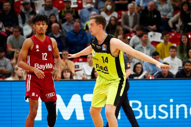 6 Matchday of the easyCredit BBL Basketball Bundesliga at Oberfrankenhalle in Bayreuth Season 2021 2022 Medi Bayreuth vs FC Bayern München Moritz Sanders Medi Bayreuth 14 right Jason George FC Bayern München 12 left