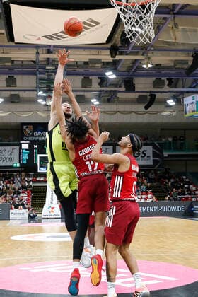 6 Matchday of the easyCredit BBL Basketball Bundesliga at Oberfrankenhalle in Bayreuth Season 2021 2022 Medi Bayreuth vs FC Bayern München Martynas Sajus Medi Bayreuth 19 left Jason George FC Bayern München 12 middle Nick Weiler Babb FC Bayern München 0 right
