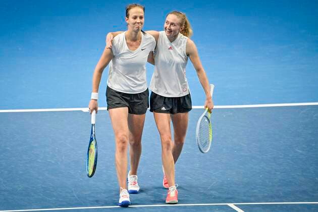 From left Vera Lapko and Aliaksandra Sasnovich (Belarus) celebrates victory after the Group B match against Elise Martens, Kirsten Flipkens (Belgium), not pictured , on November 1, 2021, in Prague, Czech Republic, within women s tennis Billie Jean King Cup (former Fed Cup). (CTK Vera Lapko, Aliaksandra Sasnovich PhotoNews Panoramic  VIS 009