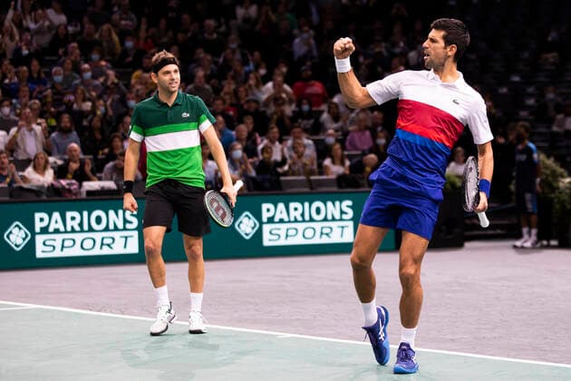Paris, France, November 1st, 2021 - Novak Djokovic (R) and Filip Krajinovic (L), both of Serbia, react during their doubles second round match against Alex de Minaur and Luke Saville, both of Australia, at the Rolex Paris Masters tennis tournament.  Copyright: xAlexisxSciardx