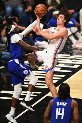 LOS ANGELES, CA - NOVEMBER 01: Oklahoma City Thunder Guard Josh Giddey (3) saves a ball from going out of bounds in front of Los Angeles Clippers Guard Reggie Jackson (1) during a NBA, Basketball Herren, USA game between the Oklahoma City Thunder and the Los Angeles Clippers on November 1, 2021 at STAPLES Center in Los Angeles, CA. (Photo by Brian Rothmuller Icon Sportswire) NBA: NOV 01 Thunder at Clippers Icon211101029