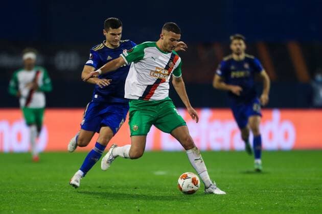 SOCCER - UEFA EL, Dinamo vs Rapid ZAGREB,CROATIA,04.NOV.21 - SOCCER - UEFA Europa League, group stage, GNK Dinamo Zagreb vs SK Rapid Wien. Image shows Amer Gojak (Dinamo) and Ercan Kara (Rapid).  GEPAxpictures xPhilippxBrem