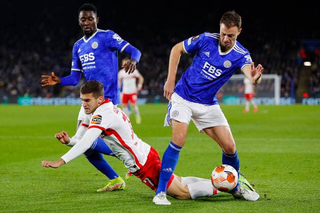 4th November 2021; King Power Stadium, Leicester, Leicestershire, England; Europa League football, Leicester City versus Spartak Moscow; Aleksandr Lomovitsky of Spartak Moscow is muscled off the ball by Jonny Evans of Leicester City  ActionPlus12336783 GrahamxWilson