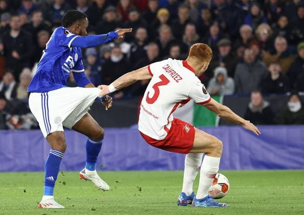 Leicester, England, 4th November 2021. Maximiliano Caufriez of Spartak Moscow pulls the shorts of Ademola Lookman of Leicester City during the UEFA Europa League match at the King Power Stadium, Leicester. Picture credit should read: Darren Staples Sportimage EDITORIAL USE ONLY. No use with unauthorised audio, video, data, fixture lists, club league logos or live services. Online in-match use limited to 120 images, no video emulation. No use in betting, games or single club league player publications. SPI-1300-0075