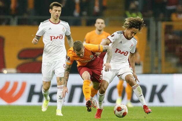 ISTANBUL, TURKEY - NOVEMBER 4, 2021: Lokomotivâ€™s Fedor Smolov, Galatasaray s Alexandru Cicaldau, and Lokomotivâ€™s Alexis Beka Beka (L-R) in action in the 2021 22 UEFA Europa League Group E Round 4 match between Galatasaray Istanbul and Lokomotiv Moscow at the Ali Sami Yen Sports Complex. Mikhail Japaridze TASS  TS116D38
