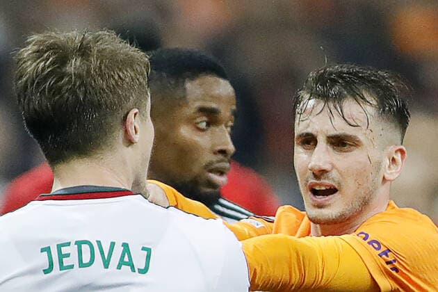 ISTANBUL, TURKEY - NOVEMBER 4, 2021: Lokomotivâ€™s Tin Jedvaj (L) and Galatasaray s Kerem Akturkoglu (R) in the 2021 22 UEFA Europa League Group E Round 4 match between Galatasaray Istanbul and Lokomotiv Moscow at the Ali Sami Yen Sports Complex. Mikhail Japaridze TASS  TS116D2A
