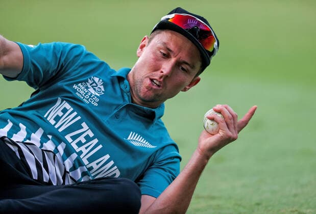 5th November 2021; Sharjah, UAE; Trent Boult of the New Zealand BlackCaps reacts after diving to take a catch to dismiss Zane Green of Namibia during the ICC Men s T20 World Cup cricket match between New Zealand and Namibia at the Sharjah Cricket Stadium, Sharjah, UAE  ActionPlus12337115 DAVIDxGRAY
