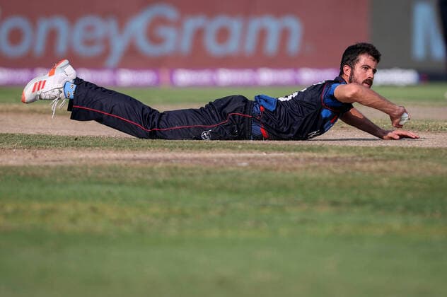 5th November 2021; Sharjah, UAE; Karl Birkenstock of Namibia dives to stop the ball during the ICC Men s T20 World Cup cricket match between New Zealand and Namibia at the Sharjah Cricket Stadium, Sharjah, UAE  ActionPlus12337074 DAVIDxGRAY
