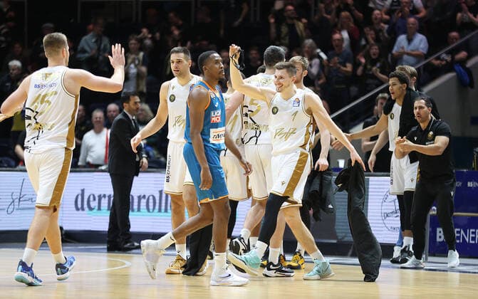 Martin Peterka Basketball Loewen Braunschweig and David Kraemer Basketball Loewen Braunschweig 1 celebrate