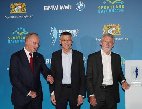 Bavarias Interior Minister Joachim Herrmann honors Karl Heinz Rummenigge with the Bavarian Sports Award 2021for his lifes work in sports from left Karl Heinz Rummenigge, Herbert Hainer, Paul Breitner Munich Bavaria Germany BMW Welt