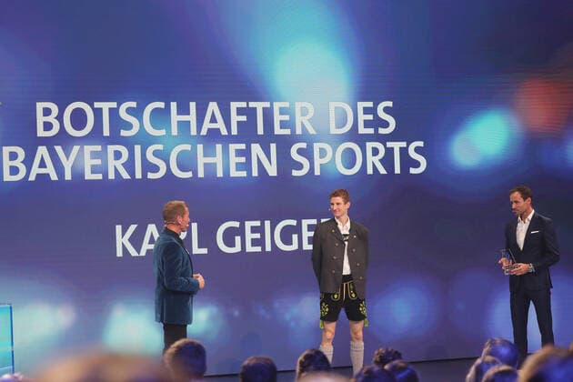 Bavarias Minister of the Interior Joachim Herrmann honours Karl Geiger with the Bavarian Sports Award 2021 as Ambassador of Bavarian Sports Markus Othmer, Karl Geiger and Sven Hannawld Munich Bavaria Germany BMW Welt
