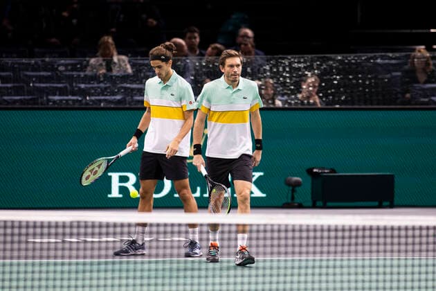 Paris, France, November 7, 2021 - French players Pierre Hugues Herbert (L) and Nicolas Mahut (R) in action during their doubles final match against Tim Puetz from Germany and Michael Venus from New Zealand, at the Rolex Paris Masters tennis tournament.  Copyright: xAlexisxSciardx