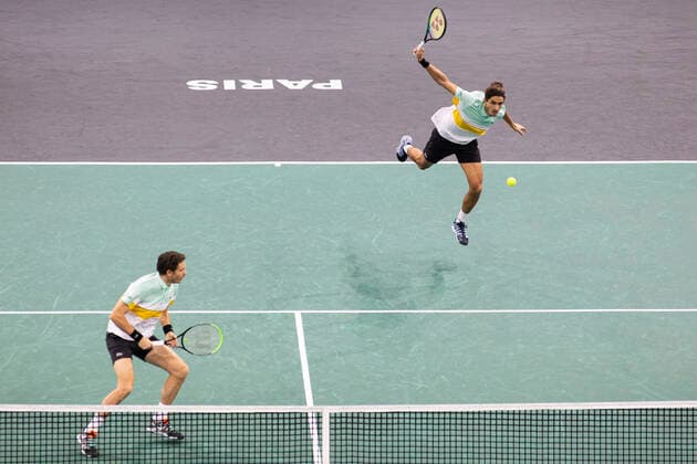 Paris, France, November 7, 2021 - French players Pierre Hugues Herbert (R) and Nicolas Mahut (L) in action during their doubles final match against Tim Puetz from Germany and Michael Venus from New Zealand, at the Rolex Paris Masters tennis tournament.  Copyright: xAlexisxSciardx