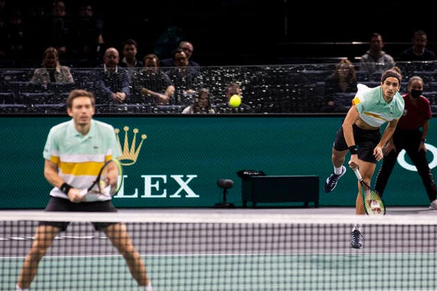 Paris, France, November 7, 2021 - French players Pierre Hugues Herbert (R) and Nicolas Mahut (L) in action during their doubles final match against Tim Puetz from Germany and Michael Venus from New Zealand, at the Rolex Paris Masters tennis tournament.  Copyright: xAlexisxSciardx