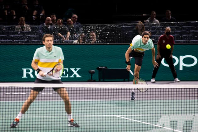 Paris, France, November 7, 2021 - French players Pierre Hugues Herbert (R) and Nicolas Mahut (L) in action during their doubles final match against Tim Puetz from Germany and Michael Venus from New Zealand, at the Rolex Paris Masters tennis tournament.  Copyright: xAlexisxSciardx