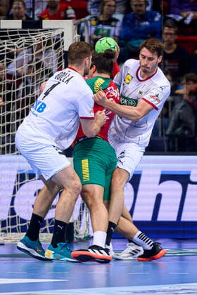 Handball, Mens Day of Handball, friendly match, Germany Portugal from left Johannes Golla Germany SG Flensburg , Luis Frade Portugal , Hendrik Wagner Germany Ludwigshafen Duesseldorf PSD Bank Dome Germany