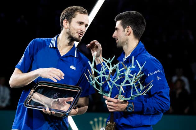 Paris, France, November 7, 2021 - Russia s Daniil Medvedev (L) and Serbia s Novak Djokovic (R) pose with their trophy after playing the men s single final tennis match of the Rolex Paris Masters tournament.  Copyright: xAlexisxSciardx
