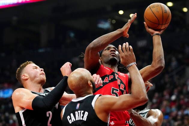 November 7, 2021, Toronto, ON, Canada: Toronto Raptors forward Precious Achiuwa (5) shoots as Brooklyn Nets forward Blake Griffin (2) and guard Jevon Carter (0) defend during first half NBA, Basketball Herren, USA basketball action in Toronto on Sunday, Nov. 7, 2021. Canada News - November 7, 2021  - ZUMAc35_ 20211107_zaf_c35_005 Copyright: xFrankxGunnx