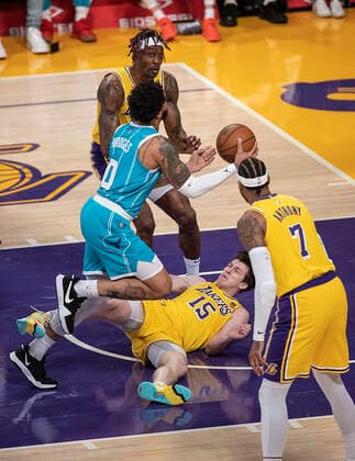 November 8, 2021, Los Angeles, California, USA: Austin Reaves 15 of the Los Angeles Lakers goes to the ground after blocking a shot by Miles Bridges 0 of the Charlotte Hornets during their regular season NBA, Basketball Herren, USA game on Monday November 8, 2021 at the Staples Center in Los Angeles, California. Lakers defeat Hornets, 126-123. PI Los Angeles USA - ZUMAp124 20211108_zaa_p124_031 Copyright: xJAVIERxROJASx