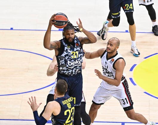 Devin Booker (L) of Fenerbahce Beko Istanbul and Shavon Shields (R) of Ax Armani Exchange Milan during the Turkish Airlines Euroleague match between Fenerbahce Beko Istanbul and Ax Armani Exchange Milan at Ulker Arena in Istanbul , Turkey on November 12 , 2021. 