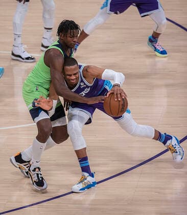 November 12, 2021, Los Angeles, California, USA: Anthony Edwards 1 of the Minnesota Timberwolves defends against Russell Westbrook 0 of the Los Angeles Lakers on Friday November 12, 2021 at the Staples Center in Los Angeles, California. Lakers lose to Timberwolves, 83-107. PI Los Angeles USA - ZUMAp124 20211112_zaa_p124_008 Copyright: xJAVIERxROJASx
