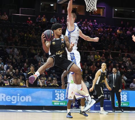 Tookie Brown Basketball Loewen Braunschweig in duel with Donovan Donaldson Fraport Skyliners Frankfurt under the basket