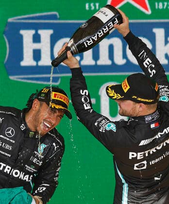Grande Prêmio São Paulo 2021 de Fórmula 1 SÃO PAULO, SP - 14.11.2021: GRANDE PRÊMIO SÃO PAULO 2021 DE FÓRMULA 1 - MERCEDES team driver Lewis Hamilton celebrates his victory alongside third-placed Valtteri Bottas during the São Paulo 2021 Formula 1 Grand Prix held at the Jose Carlos Pace Autodrome in Interlagos, São Paulo, SP. (Photo: Rodolfo Buhrer La Imagem Fotoarena) x2141721x  RodolfoxBuhrer