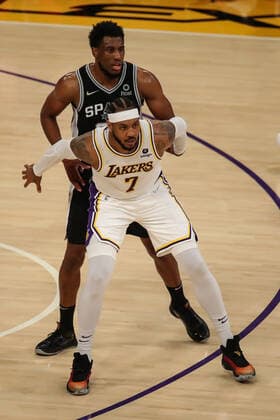 LOS ANGELES, CA - NOVEMBER 14: Los Angeles Lakers forward Carmelo Anthony 7 fending off San Antonio Spurs forward Thaddeus Young 30 during the San Antonio Spurs vs Los Angeles Lakers game on November 14, 2021, at Staples Center in Los Angeles, CA. (Photo by Jevone Moore Icon Sportswire) NBA, Basketball Herren, USA NOV 14 Spurs at Lakers Icon2111144087
