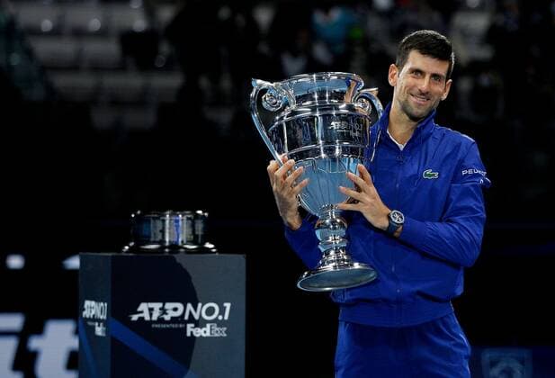 Mandatory Credit: Photo by Ella Ling Shutterstock (12603333bp) Novak Djokovic of Serbia celebrates with the Year End No.1 ATP, Tennis Herren trophy Nitto ATP World Tour Finals, Day 2, Tennis, Pala Alpitour, Turin, Italy - 15 Nov 2021 Nitto ATP World Tour Finals, Day 2, Tennis, Pala Alpitour, Turin, Italy - 15 Nov 2021 Copyright: xEllaxLing Shutterstockx 12603333bp
