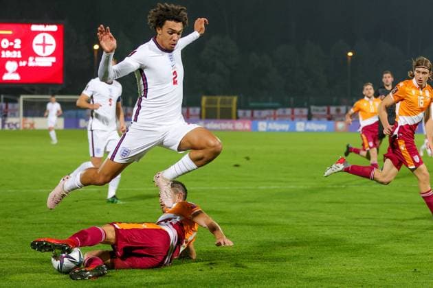 San Marino v England FIFA World Cup, WM, Weltmeisterschaft, Fussball Qualifier 15 11 2021. Dante Rossi (6) of San Marino slides in and tackles Trent Alexander-Arnold (2) of England during the FIFA World Cup Qualifier match between San Marino and England at Stadio Olimpico, Serravalle, San Marino on 15 November 2021. Editorial use only , Copyright: xNigelxKeenex PSI-14035-0031