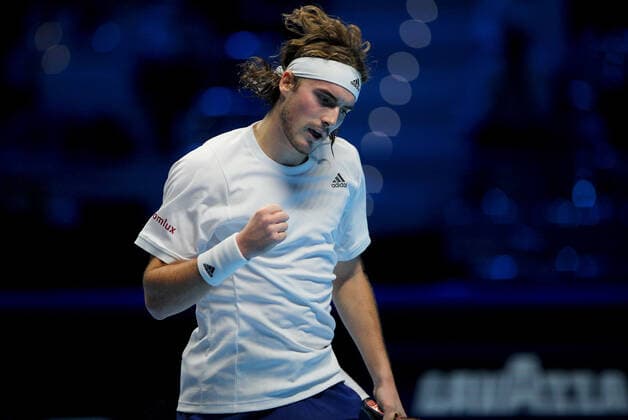 Mandatory Credit: Photo by Ella Ling Shutterstock (12603333cx) Stefanos Tsitsipas of Greece celebrates Nitto ATP, Tennis Herren World Tour Finals, Day 2, Tennis, Pala Alpitour, Turin, Italy - 15 Nov 2021 Nitto ATP World Tour Finals, Day 2, Tennis, Pala Alpitour, Turin, Italy - 15 Nov 2021 Copyright: xEllaxLing Shutterstockx 12603333cx