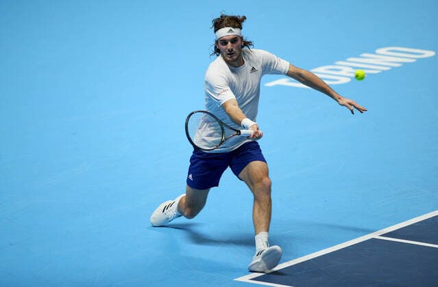 Mandatory Credit: Photo by Ella Ling Shutterstock (12603333dl) Stefanos Tsitsipas of Greece in action Nitto ATP, Tennis Herren World Tour Finals, Day 2, Tennis, Pala Alpitour, Turin, Italy - 15 Nov 2021 Nitto ATP World Tour Finals, Day 2, Tennis, Pala Alpitour, Turin, Italy - 15 Nov 2021 Copyright: xEllaxLing Shutterstockx 12603333dl