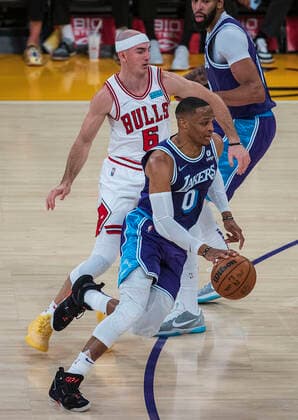 November 15, 2021, Los Angeles, California, USA: Russell Westbrook 0 of the Los Angeles Lakers drives past Alex Caruso 6 of the Chicago Bulls during their regular season NBA, Basketball Herren, USA game on Monday November 15, 2021 at the Staples Center in Los Angeles, California. Lakers lose to the Bulls, 121-103. PI Los Angeles USA - ZUMAp124 20211115_zaa_p124_015 Copyright: xJAVIERxROJASx