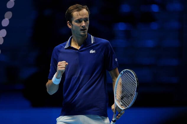 Mandatory Credit: Photo by Ella Ling Shutterstock (12603335a) Daniil Medvedev of Russia celebrates Nitto ATP, Tennis Herren World Tour Finals, Day 3, Tennis, Pala Alpitour, Turin, Italy - 16 Nov 2021 Nitto ATP World Tour Finals, Day 3, Tennis, Pala Alpitour, Turin, Italy - 16 Nov 2021  Copyright: xEllaxLing Shutterstockx 12603335a