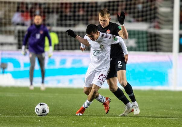 November 16, 2021, EDMONTON, ab, Canada: Canada s Alistair Johnston (2) and Mexico s Hirving Rodrigo Lozano Bahena (22) via for the ball during World Cup Qualifiers in Edmonton, Tuesday, Nov. 16, 2021. Alistair Johnston Hirving Rodrigo Lozano Bahena  - ZUMAc35_ 20211116_zaf_c35_174 Copyright: xJasonxFransonx