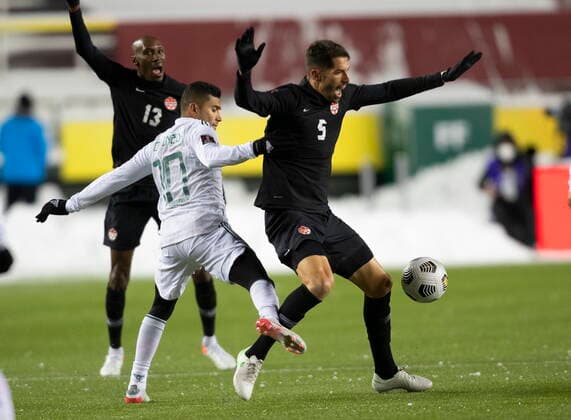 November 16, 2021, EDMONTON, ab, Canada: Canada s Steven VitoÂ³ria (5) and Mexico s Orbelin Pineda Alvarado (10) via for the ball during World Cup Qualifiers in Edmonton, Tuesday, Nov. 16, 2021. Steven Vitoria Orbelin Pineda Alvarado  - ZUMAc35_ 20211116_zaf_c35_176 Copyright: xJasonxFransonx