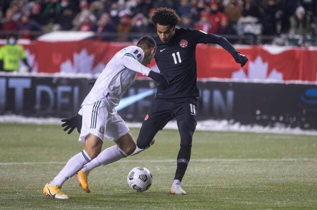 November 16, 2021, EDMONTON, ab, Canada: Canada s Tajon Buchanan (11) and Mexico s Julio Cesar Dominguez Juarez (3) via for the ball during World Cup Qualifiers in Edmonton, Tuesday, Nov. 16, 2021. Tajon Buchannan Julio Cesar Domingguez Juarez  - ZUMAc35_ 20211116_zaf_c35_178 Copyright: xJasonxFransonx
