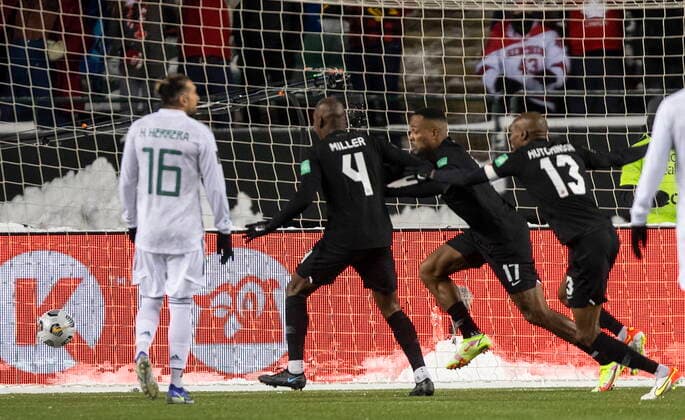 November 16, 2021, EDMONTON, ab, Canada: Canada s Cyle Larin (17), Kamal Miller (4) and Atiba Hutchinson (13) celebrate a goal against Mexico during second half World Cup Qualifiers in Edmonton, Tuesday, Nov. 16, 2021. Cyle Larin Kamal Miller Atiba Hutchinson  - ZUMAc35_ 20211116_zaf_c35_197 Copyright: xJasonxFransonx