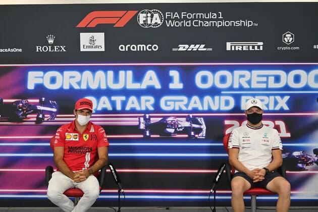 F1 Grand Prix of Qatar 55 Carlos Sainz (ESP, Scuderia Ferrari Mission Winnow), 77 Valtteri Bottas (FIN, Mercedes-AMG Petronas F1 Team), F1 Grand Prix of Qatar at Losail International Circuit on November 18, 2021 in Doha, Qatar. (Photo by ANDREJ ISAKOVIC AFP FIA Pool via HOCH ZWEI) Doha Qatar Poolfoto HOCH ZWEI Pool AFP ,EDITORIAL USE ONLY