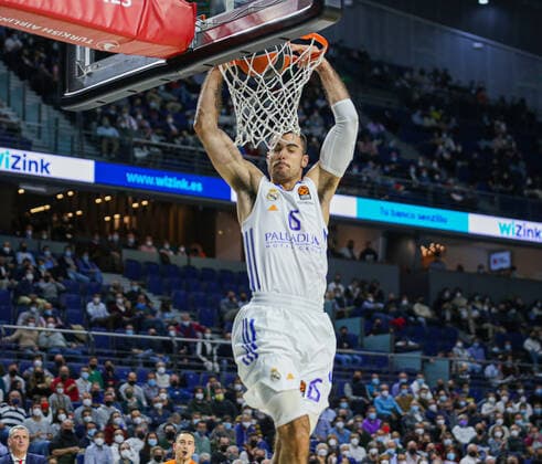 18th November 2021; Wizink Center; Madrid, Spain; Turkish Airlines Euroleague Basketball , Real Madrid versus Crvena Zvezda of Belgrade; Alberto Abalde (Real Madrid Baloncesto) hangs from the net after a dunk  ActionPlus12340157 AgenciaLOF