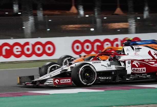 Formula 1 Ooredoo Qatar Grand Prix 2021 19 11 2021, Losail International Circuit, Doha, Formula 1 Ooredoo Qatar Grand Prix 2021 ,in the picture Kimi Raikkonen FIN , Alfa Romeo Racing ORLEN, Lando Norris GBR , McLaren F1 Team nordphotoxGmbHx xBratic nph00250