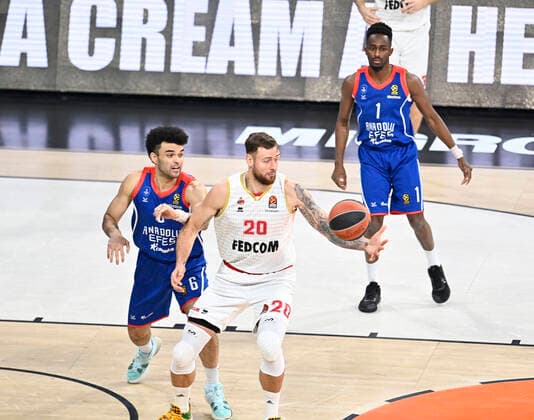 Rodrigue Beaubois (1) , Elijah Bryant (6) of Anadolu Efes Istanbul and Donatas Motiejunas (20) of AS Monaco during the Turkish Airlines Euroleague match between Anadolu Efes Istanbul and As Monaco at Sinan Erdem Arena in Istanbul , Turkey on November 19 , 2021. 