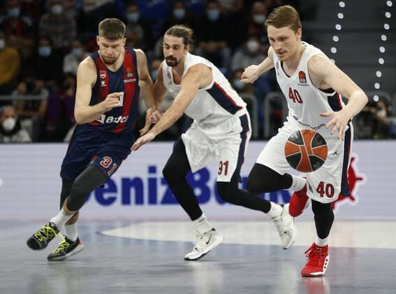 Spain Basketball Euroleague Baskonia - CSKA 6700207 19.11.2021 From left, Baskonia s Rokas Giedraitis, CSKA s Alexey Shved, and CSKA s Marius Grigonis struggle for a ball during the Euroleague basketball match between Saski Baskonia and CSKA Moscow, in Vitoria, Spain. Mikhail Serbin Sputnik Vitoria-Gasteiz Spain  Copyright: xMikhailxSerbinx