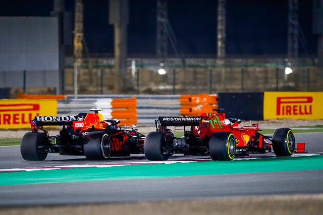 11 PEREZ Sergio (mex), Red Bull Racing Honda RB16B, 16 LECLERC Charles (mco), Scuderia Ferrari SF21, action during the Formula 1 Ooredoo Qatar Grand Prix 2021, 20th round of the 2021 FIA Formula One World Championship, WM, Weltmeisterschaft from November 19 to 21, 2021 on the Losail International Circuit, in Lusail, Qatar - F1 - QATAR GRAND PRIX 2021 - RACE DPPI Panoramic  00121042__B2_4666.JPG_