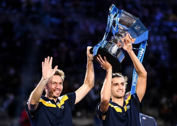 Italy Tennis ATP, Tennis Herren Finals 6701196 21.11.2021 France s Pierre-Hugues Herbert and Nicolas Mahut pose with a trophy during an award ceremony for the doubles final match against Britain s Joe Salisbury and Rajeev Ram, of the United States, at the ATP Finals at the Pala Alpitour venue in Turin, Italy. Alexey Filippov Sputnik Turin Italy  Copyright: xAlexeyxFilippovx