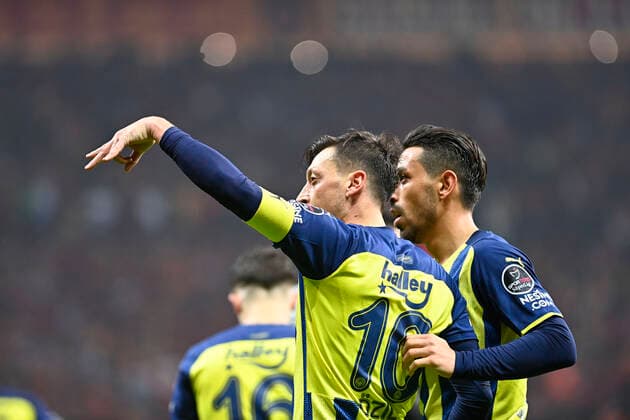 Mesut Ozil and Irfan Can Kahveci of Fenerbahce during the Turkish super league big derby match between Galatasaray and Fenerbahce at NEF stadium in Istanbul , Turkey on November 21, 2021. 